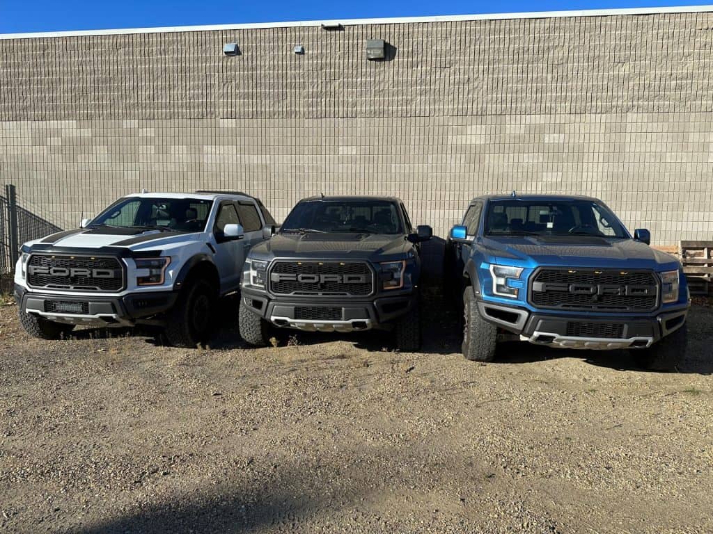 Three Ford Raptors.