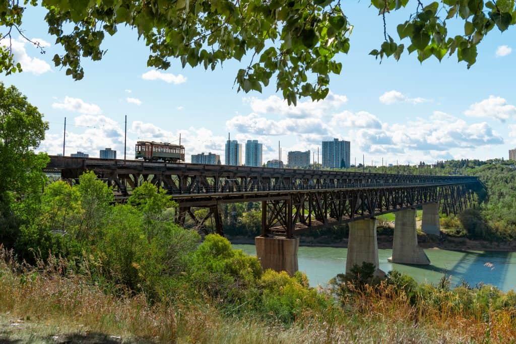 Edmonton skyline with sun and clouds