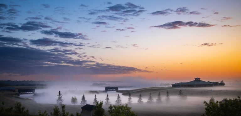 Misty Northeast river valley park.