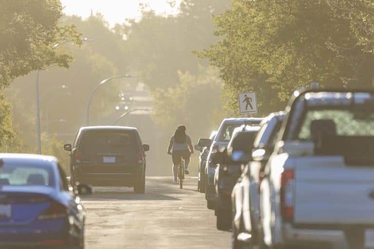 Cyclist on a neighbourhood street.