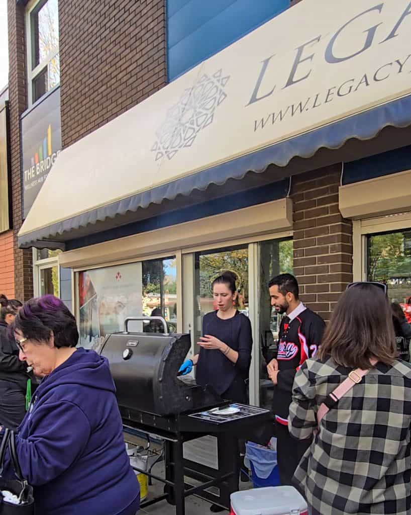 Legacy Jewellers team and volunteers working the grill, ensuring all guests have a great experience.