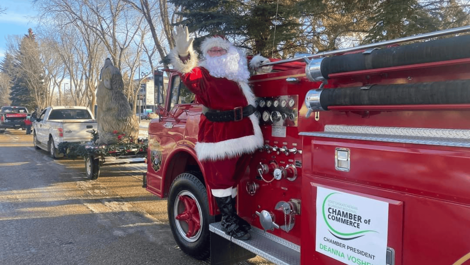 Santa riding a fire truck at the Fort Saskatchewan Santa Clause Parade