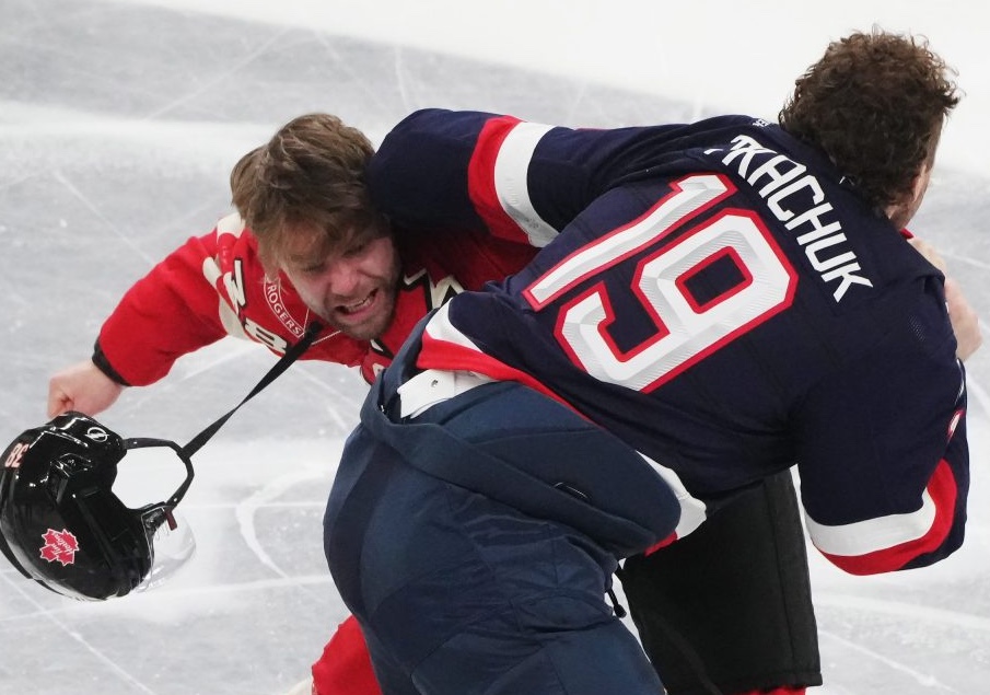 Canada's Brandon Hagel and United States' Matthew Tkachuk fight