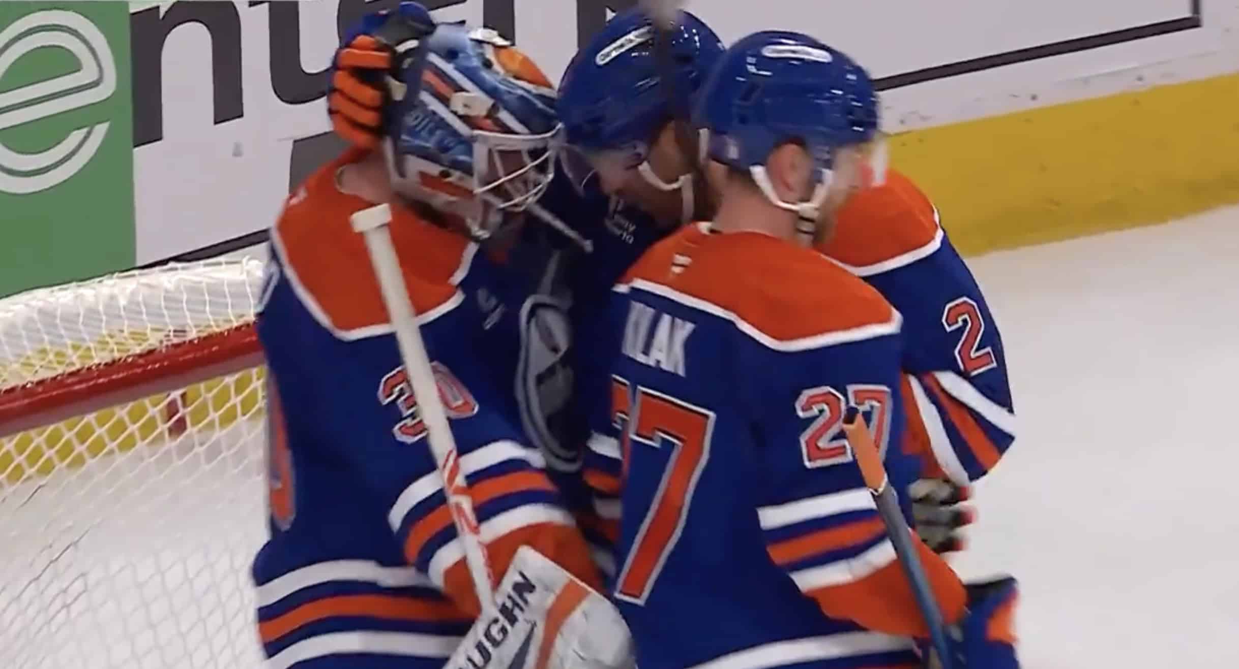 Teammates congratulate Oilers goaltender Calvin Pickard after series-clinching Game 6.