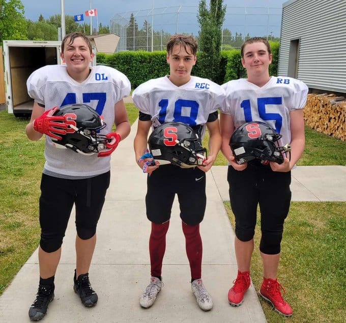 Mason Funk (left), Travis Heal (centre), and Micah Lorenzin (right) will represent Alberta at the Under 16 Football National Championships
